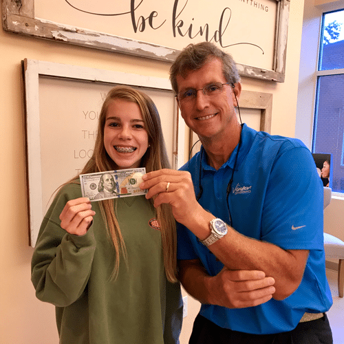 Emily with Dr. Britt Vinson, Emily won our latest contest and received $100 cash
