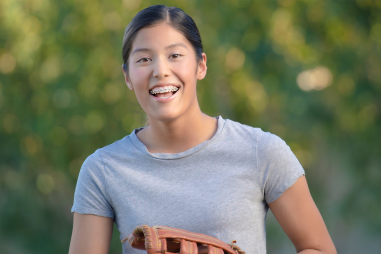 smiling teen playing sports