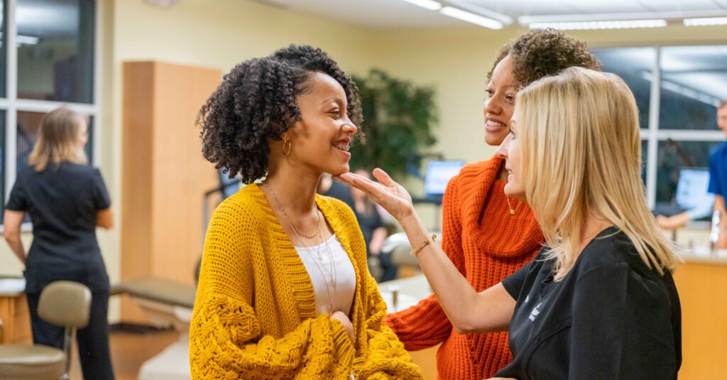 Relieved mother and daughter after receiving emergency orthodontic treatment inn Clayton, NC